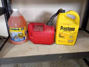 lot 2019 image: Rain X All Season Wiper Fluid, Prestone Anti Freeze and a 1gal. 4oz. Gas Can.  Both are full
