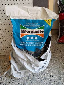 lot 2022 image: Miloganite Lawn Fertilizer.   Opened bag but still fairly full