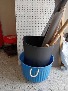lot 2025 image: Bucket with Rope Handles, Trashcan with Lid and Sticks, Black Screen for fixing windows and a Roll of Weed Prevention