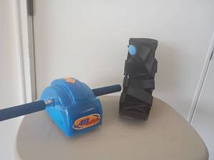 lot 2101 image: AB Slide and a Medical Boot.  Size Small