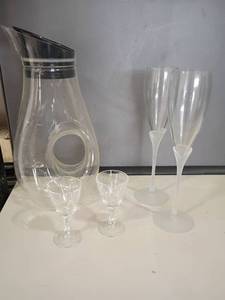 lot 2214 image: Plastic Wine Decanter and Glass Champagne Flutes and Glass Cordial Glasses