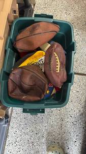 lot 2331 image: Deflated footballs, basketballs and more in tote