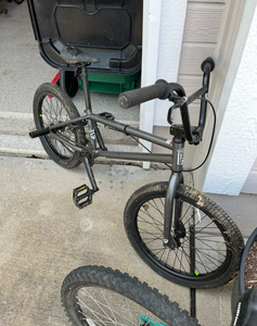 BMX Bike with Curved Handlebars and Pegs