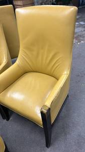 lot 70801 image: Yellow Upholstered Wingback Chair with Black Legs