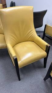 lot 70802 image: Yellow Upholstered Armchair with Black Legs
