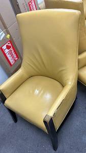 lot 70803 image: Yellow Upholstered Wingback Chair with Dark Wood Legs Back 43 inches tall