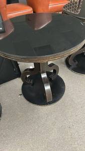 lot 70812 image: Round Pedestal Table with Black Top and Gold Trim 30 round and 30 tall