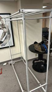 lot 70815 image: 5 foot Double Sided Metal Clothing Rack with 4 Horizontal Bars and Casters