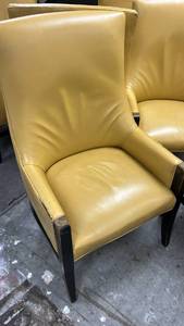 lot 70881 image: Yellow Upholstered Wingback Chair with Dark Wood Legs