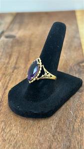 lot 7081 image: 10K Gold Ring with Purple Marquise Stone size 7
