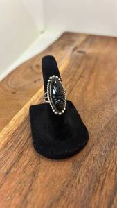 lot 7095 image: Taxco Mexican Mask Oval Black Stone Ring with Beaded Metal Setting 925