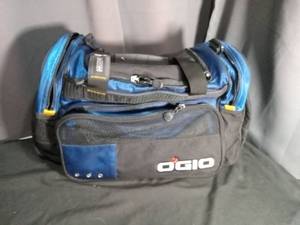 lot 7138 image: OGIO Blue Black Duffel Bag with Bayer Branded Interior