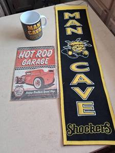 lot 42 image: Wichita State Shockers MAN CAVE Wall Banner Flag 10 x 32 inches