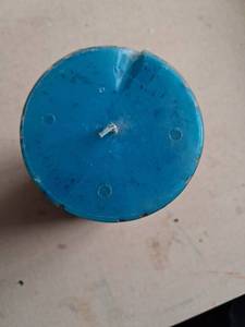 lot 68 image: Turquoise Pillar Candle with Quatrefoil Pattern 3 inches