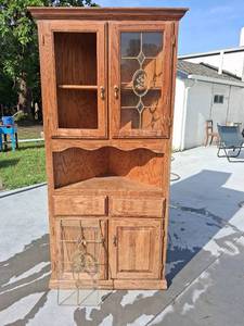 lot 74 image: Wood Cabinet with Glass Doors and Decorative Handles