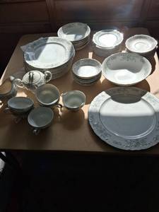 lot 92 image: Porcelain Dinnerware Set with Floral Border Pattern Plates Bowls Cups