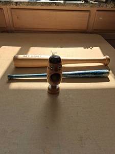 lot 106 image: Carved Wood Face Nutcracker Figure with Two Mini Baseball Bats
