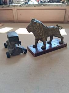 lot 108 image: Metal Dog Figurine Mounted on Wood Base with Handle with metal bank car.