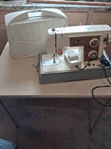 lot 120 image: Precision Built Sewing Machine Made in Japan