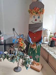 lot 180 image: Decorative Folk Art Figure with Faux Flowers and Metal Stand