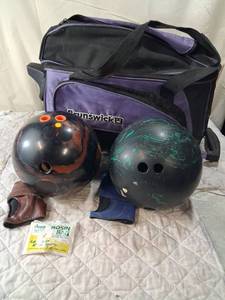 lot 206 image: Brunswick Bowling Ball Roller Bag with 2 Bowling Balls and Accessories