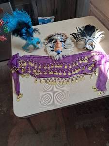 lot 230 image: Carnival Masquerade Masks 4-Piece Lot with Feathers and Coin Belt