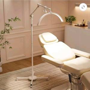 lot 18337 image: OmySalon Half Moon Light Lash Lamp, Movable Shadowless LED Floor Lamp wAdjustable Height & Phone Holder, Dimmable Lighting for Eyelash Extensions, Lash Tech, Nail, Tattoo, Esthetician & Salon (Black) - Retail $88