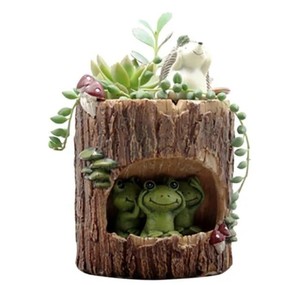 lot 1901 image: Home resin garden tree stump with animals