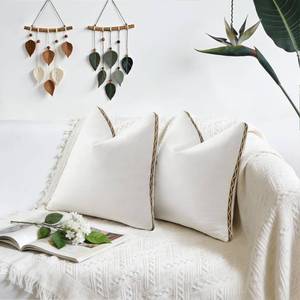lot 2297 image: Zkanac Boho Throw Pillow Covers  Decorative Pillow, Cotton & Polyester Fabric  Braid Fringe Sytle for Living Room (White & Brown, 18x18 Inch)