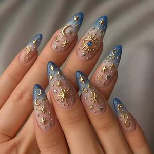 lot 6378 image: Gold Star Press on Nails Medium Almond Fake Nails Blue Ombre False Nails with 3D Eye Moon Designs Glue on Nails Gradient Acrylic Nails for Women Manicure 24Pcs