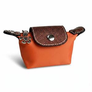 lot 12404 image: Wuflyover Coin Purse for Women, Mini Nylon Change Purse with Keychain, Small Zip Pouch for Coins, Cash, Cards (Orange)