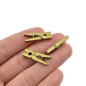 lot 12413 image: HAHIYO Gold Wooden Clothes Pins Clothespins Mini Do NOT Fall Apart 1 inches Length 80 Pack Sturdy Strong Springs No Rust No Discoloration for Laundry Bathroom DIY Craft Photos Food Opened Bags
