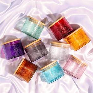 lot 1140 image: 10 oz Multi-color Mandala Glass Candle Jars with Bamboo Lids, 9 Pack ONE MISSING