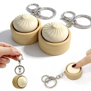 lot 4412 image: 2 Pack Dumpling Keyboard Fidget Toy �� Crisp Sound,Creamy,Stress Relief Fidget Clicker Keychain,Quiet Anxiety Toys for Adults at Work, Travel, Home �� Anxiety Relief & Focus Boost (2 PC)