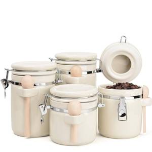 lot 7684 image: ZEBERBO 4 Piece Airtight Ceramic Canister Set With Attached Wooden Spoon Reusable Chalk Labels For Dry Goods Sugar Coffee Tea Kitchen Storage Use (Cream)