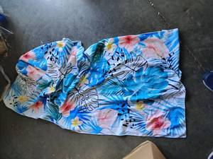 lot 2250 image: Foldable towel that folds into bag approximately 5 foot by 2 ft