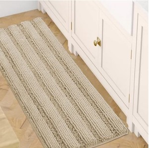 lot 2214 image: Tan bath mat  approximately 31x22 in - Stock images may not match actual product images