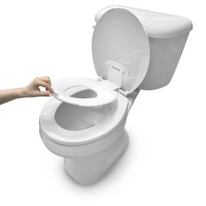 lot 2387 image: Ingenuity ity by Ingenuity Flip & Sit Potty Seat (White) �� Easy to Set Up & Remove Potty Training Seat That Attaches to Adult Toilet Seat