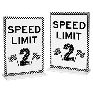 lot 12439 image: Race Car Birthday Decor, 2PC Speed Limit 2 Sign, Fast One, Race Car Birthday Party Decorations, 5x7 Inches Acrylic Sign With Stand, Lets Go Racing Party Supplies for Boy Race Fans A2