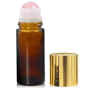 lot 20409 image: Warmify 1.7oz Refillable Rose Quartz Roller Bottles for Oils