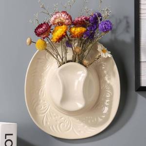 lot 1501 image: Hanging Wall planters for Indoor Plants, Ceramic Cowboy Wall vases for Flowers, for Bathroom, Living Room, Office, and Home Decor.7.9 x 7.2 x 2.4IN