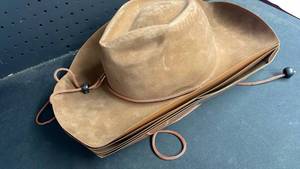 lot 10020 image: Cowboy Hat with Chin Strap and Drawstring