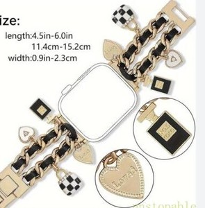lot 4320 image: Gold-Tone Charm Bracelet with Multiple Charms in Black Display Box