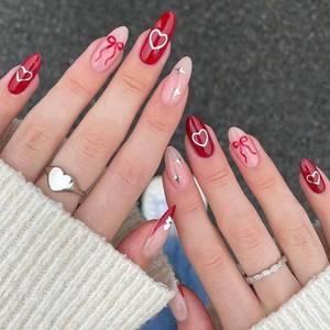 lot 10101 image: Valentines Press on Nails Long Almond Red Fake Nails with Hearts Designs Cute Bow Fingernails Gel Acrylic Nails Press ons Medium Length Glue on Nails Dark Red Coquette Stick on Nails for Women 24Pcs