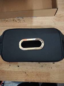 lot 1665 image: Black car seat pouch attachable to car headrest