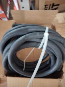 lot 1833 image: Black Air compressor hose no size missing attachments