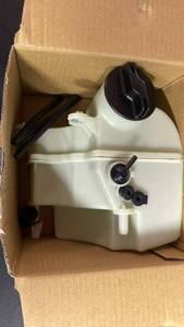 lot 10222 image: White Plastic Windshield Washer Fluid Reservoir with Black Cap and Hardware