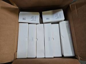 lot 18783 image: Bulk Lot of White Retail Boxes, Screen Protectors, Belt Buckles, and more