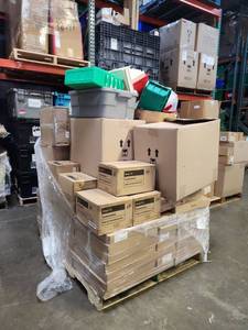 lot 18836 image: Pallet Lot of Storage Bins, Pan Liners, ONN Headphones, Car Seat Protectors, TV Mount, and More