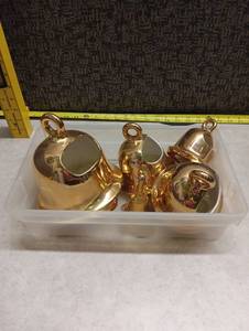 lot 101 image: Gold Plant display lot of 4 and small golden bell